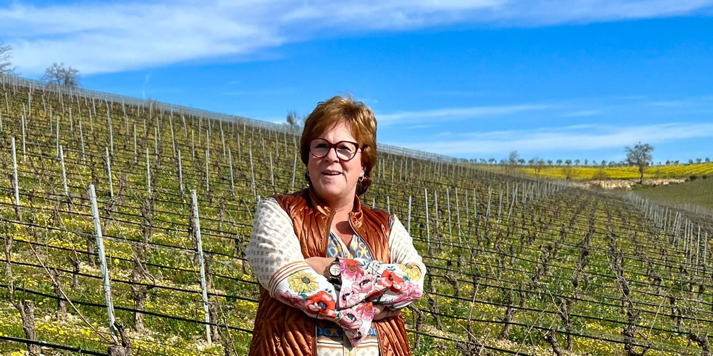 Lia Tolaini Banville in vineyard